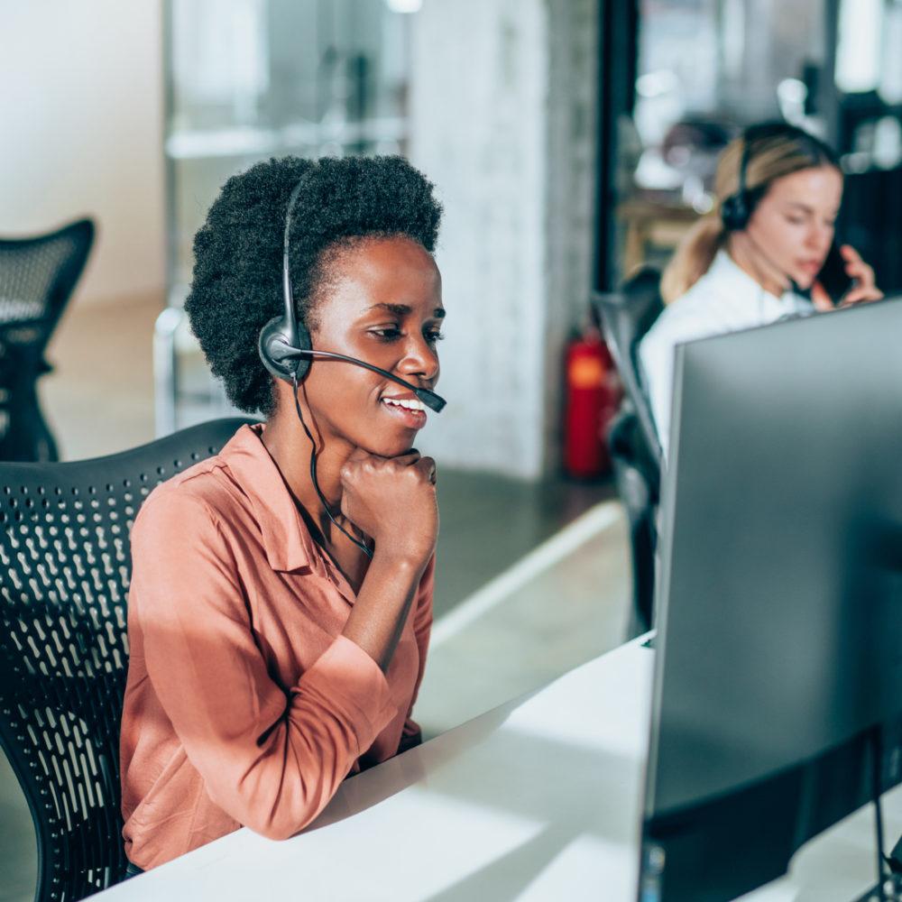 woman on headset providing remote IBM storage maintenance